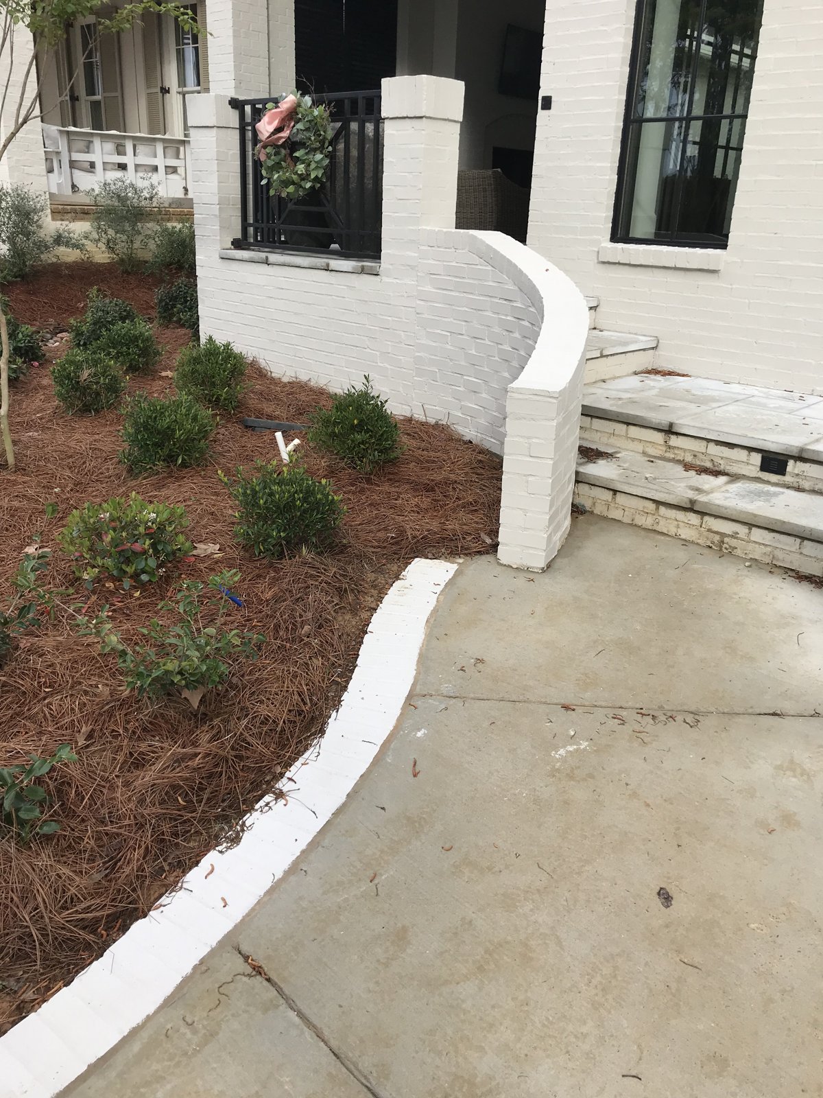 Freshened foundation planting beds