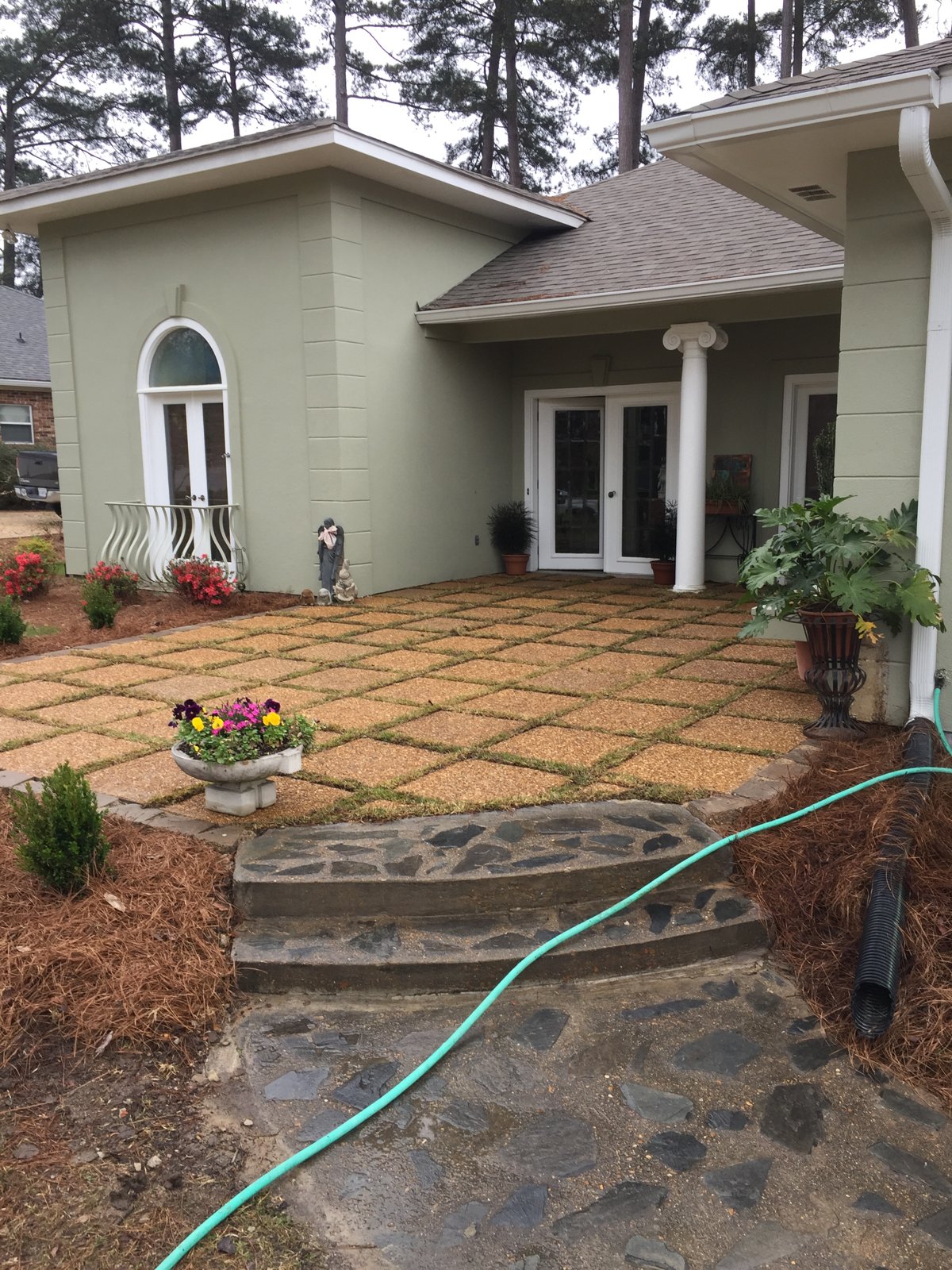 Finished patio and refreshed planting beds