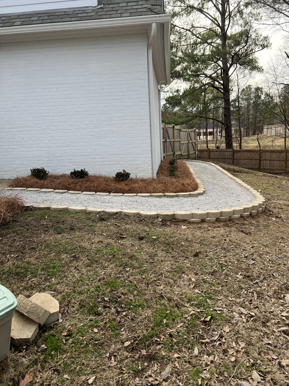 Walkway with retaining blocks